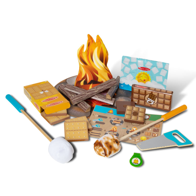 The loose pieces of The Melissa & Doug Let's Explore Campfire S'Mores Play Set