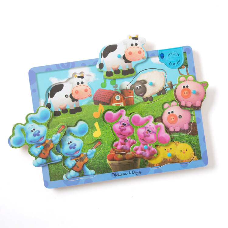 The loose pieces of The Melissa & Doug Blue's Clues & You! Wooden Sound Puzzle - Musical Farm (6 Pieces)