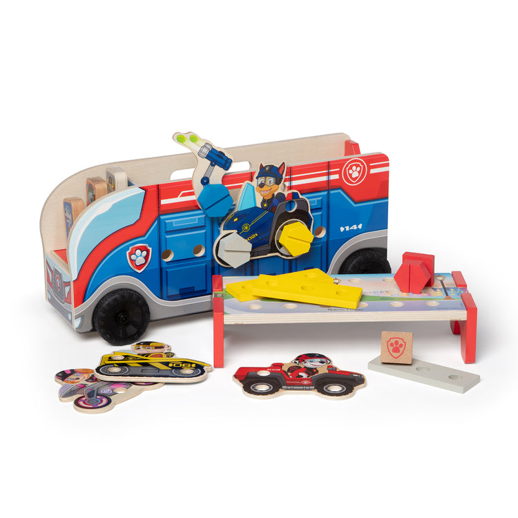 The loose pieces of The Melissa & Doug PAW Patrol Match & Build Mission Cruiser