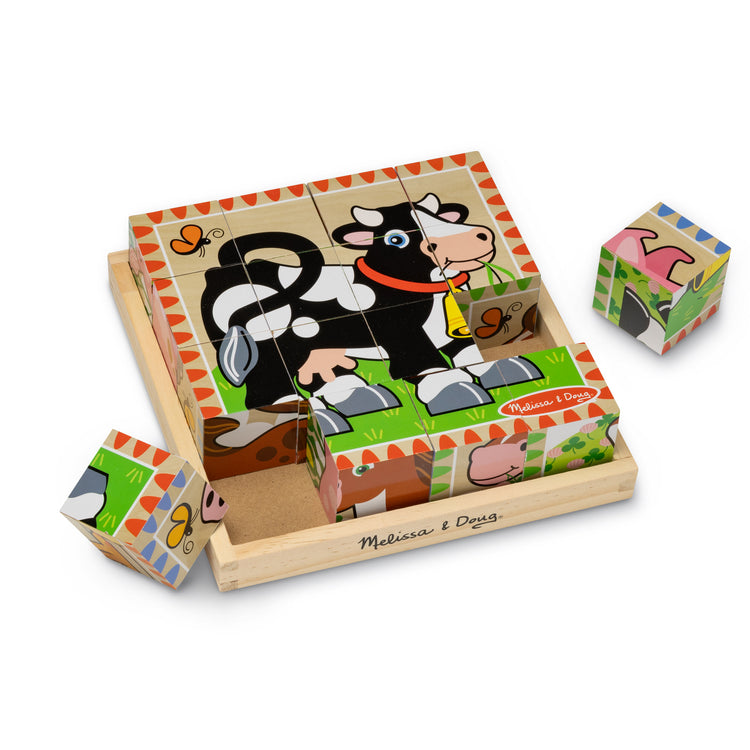 An assembled or decorated image of The Melissa & Doug Farm Wooden Cube Puzzle With Storage Tray - 6 Puzzles in 1 (16 pcs)