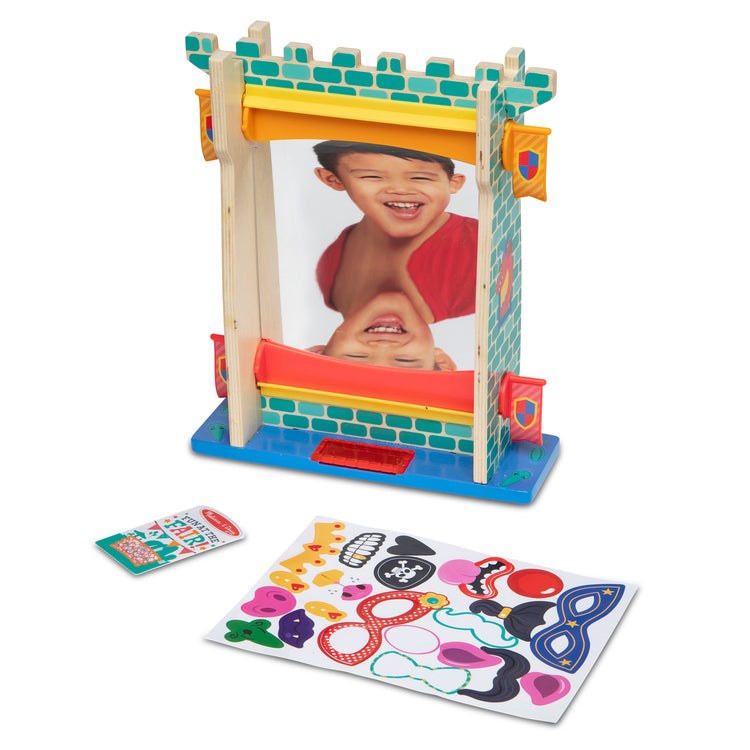 The loose pieces of The Melissa & Doug Fun at the Fair! Wooden Double-Sided Funhouse Mirror