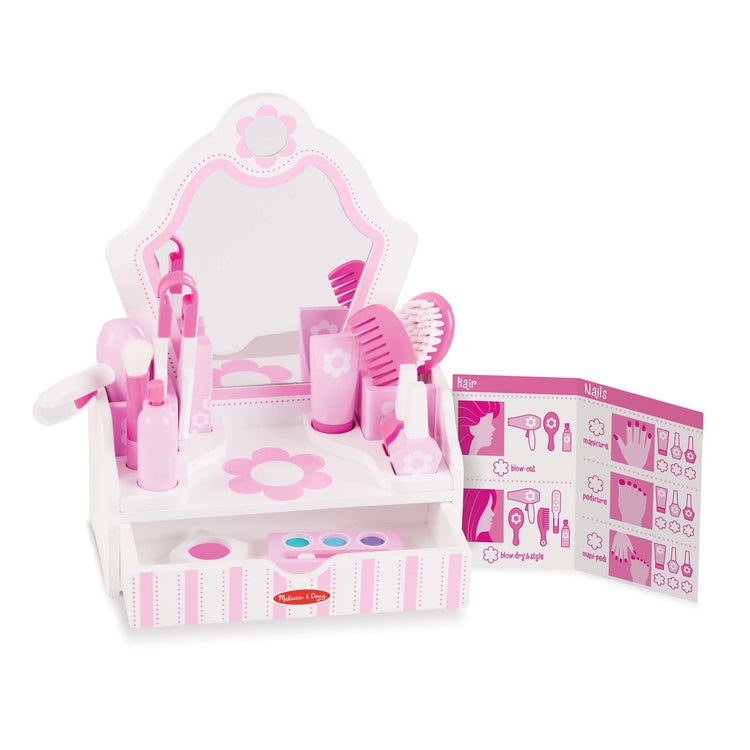 An assembled or decorated image of The Melissa & Doug Wooden Beauty Salon Play Set With Vanity and Accessories (18 pcs)