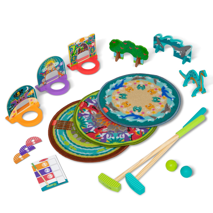 The loose pieces of The Melissa & Doug Fun at the Fair! Mini Golf Play Set – 3 Multi-Themed Holes and Wooden Obstacles