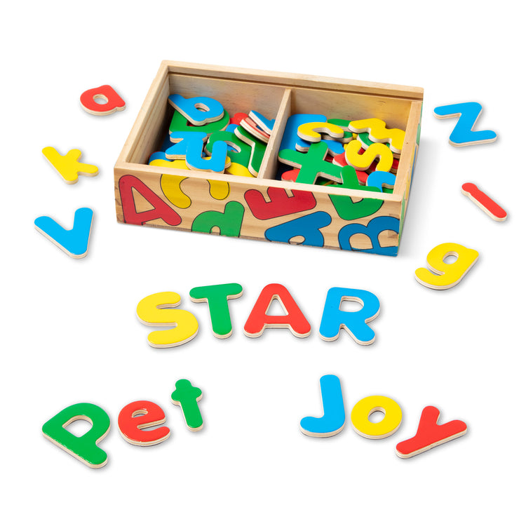 The loose pieces of The Melissa & Doug 52 Wooden Alphabet Magnets in a Box - Uppercase and Lowercase Letters