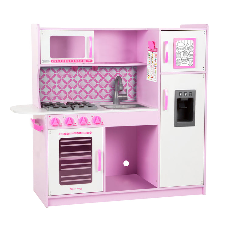 An assembled or decorated image of The Melissa & Doug Wooden Chef’s Pretend Play Toy Kitchen With “Ice” Cube Dispenser – Cupcake Pink/White