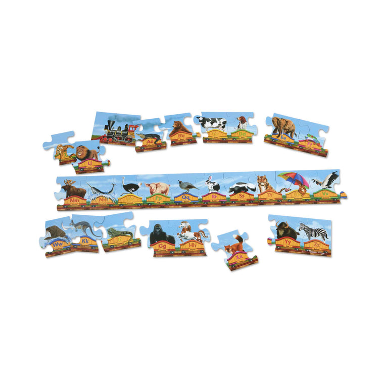 The loose pieces of The Melissa & Doug Alphabet Train Jumbo Jigsaw Floor Puzzle - Letters and Animals (28 pcs, 10 feet long)