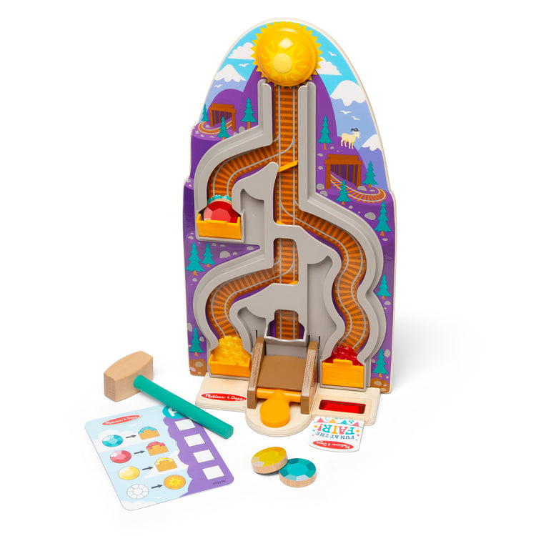 The loose pieces of The Melissa & Doug Fun at the Fair! Wooden Ring the Bell Game