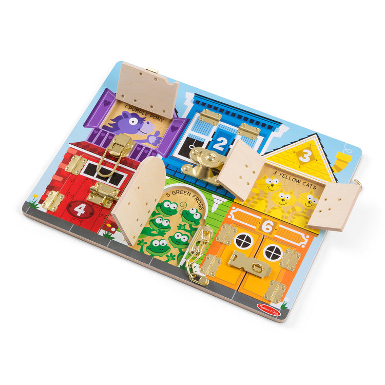 The loose pieces of The Melissa & Doug Latches Wooden Activity Board