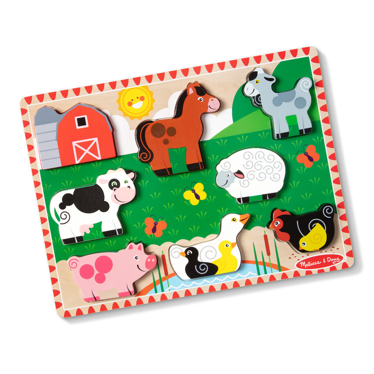 The loose pieces of The Melissa & Doug Farm Wooden Chunky Puzzle (8 pcs)