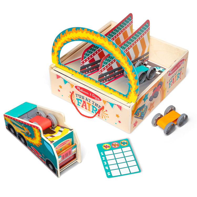 The loose pieces of The Melissa & Doug Fun at the Fair! Wooden Ring of Fire Stunt Jumper Cars Game