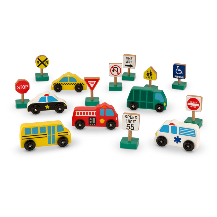 The loose pieces of The Melissa & Doug Wooden Vehicles and Traffic Signs With 6 Cars and 9 Signs