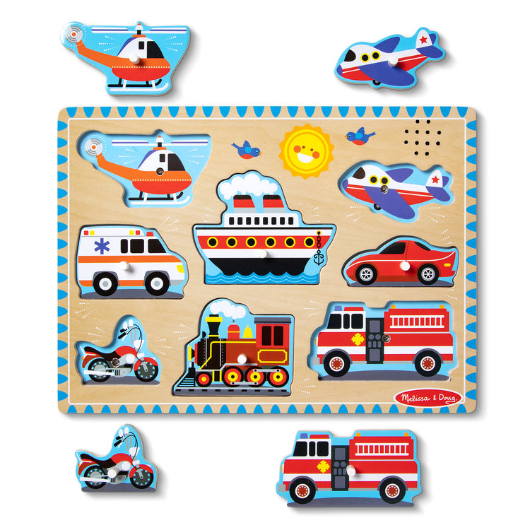 The loose pieces of The Melissa & Doug Vehicles Sound Puzzle - Wooden Peg Puzzle With Sound Effects (8 pcs)