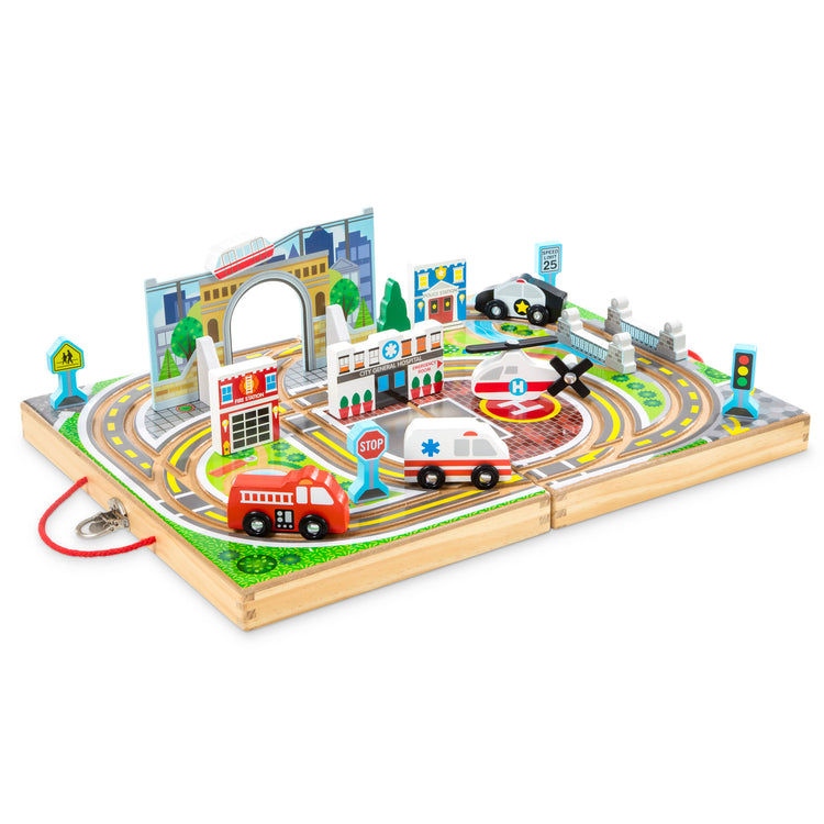 An assembled or decorated image of The Melissa & Doug 18-Piece Wooden Take-Along Tabletop Town, 4 Rescue Vehicles, Play Pieces, Bridge
