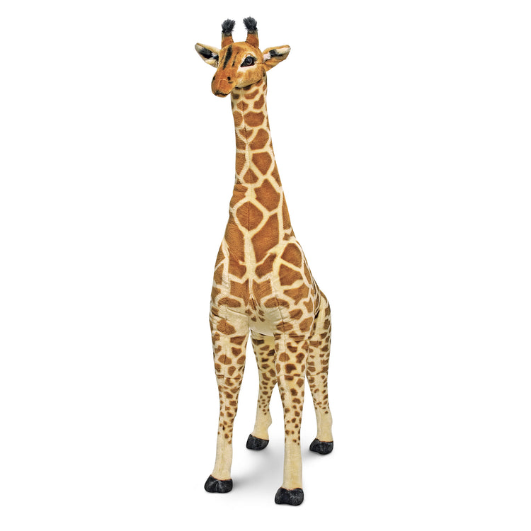 The loose pieces of The Melissa & Doug Giant Giraffe - Lifelike Plush Stuffed Animal (over 4 feet tall)