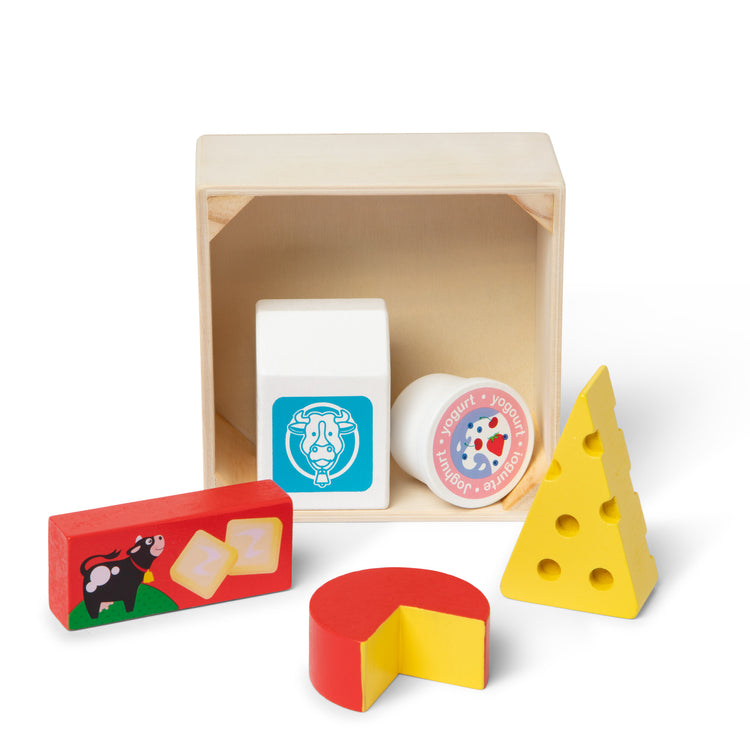 The loose pieces of The Melissa & Doug Wooden Food Groups Play Food Set – Dairy