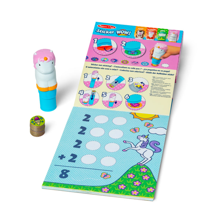 The loose pieces of The Melissa & Doug Sticker WOW!™ Unicorn Bundle: Sticker Stamper, 24-Page Activity Pad, 600 Total Stickers, Arts and Crafts Fidget Toy Collectible Character