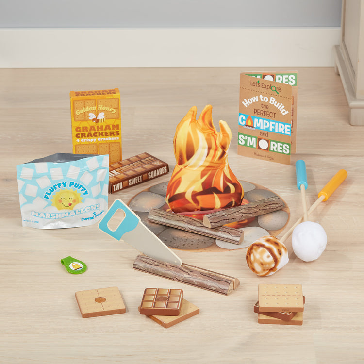 A playroom scene with The Melissa & Doug Let's Explore Campfire S'Mores Play Set