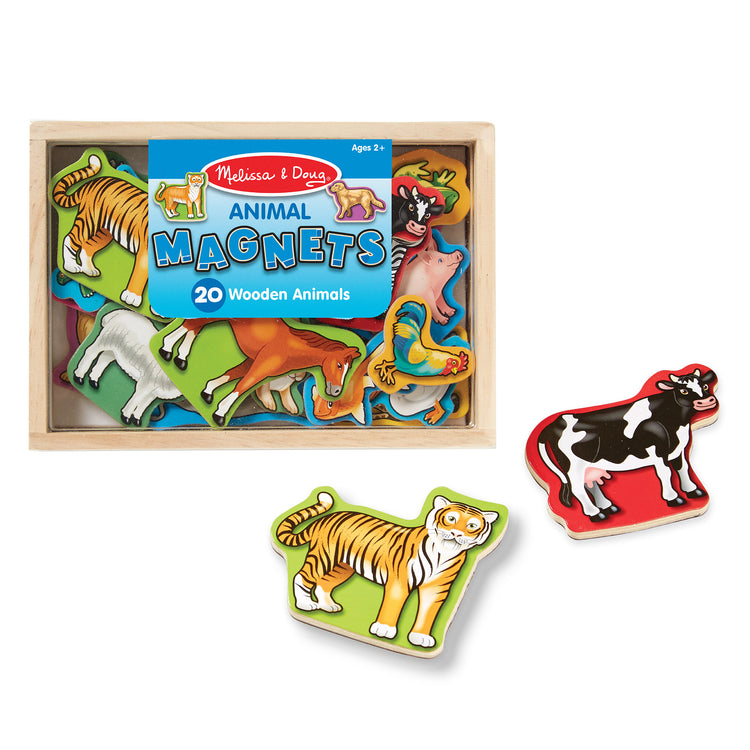 The loose pieces of The Melissa & Doug 20 Wooden Animal Magnets in a Box