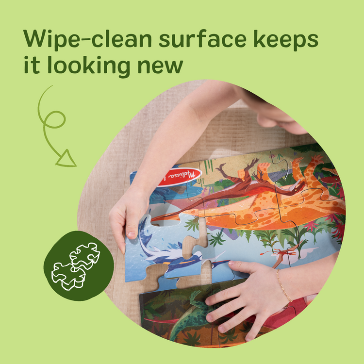 The front of the box for The Melissa & Doug Dinosaurs Jumbo Floor Puzzle, 48-Piece Prehistoric-Themed Jigsaw Puzzle with Dinosaurs and Illustrated Guide, 3 x 2 Foot Kids Puzzles for Toddlers Ages 3+