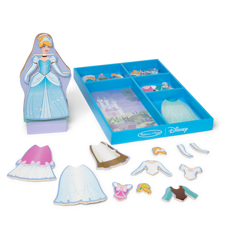 The loose pieces of The Melissa & Doug Disney Princess Cinderella Magnetic Dress-Up Wooden Doll Pretend Play Set (30+ pcs)