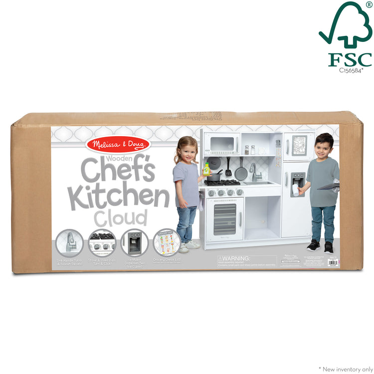 The front of the box for The Melissa & Doug Wooden Chef’s Pretend Play Toy Kitchen With “Ice” Cube Dispenser – Cloud White