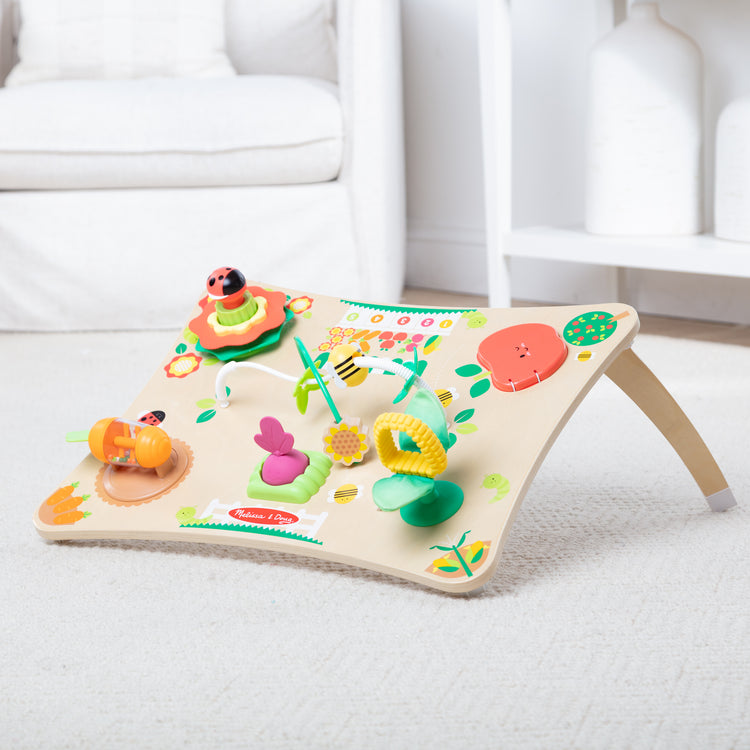 A playroom scene with The Farmers Market 3 in 1 Activity Center
