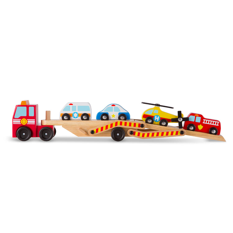 The loose pieces of The Melissa & Doug Wooden Emergency Vehicle Carrier Truck With 1 Truck and 4 Rescue Vehicles
