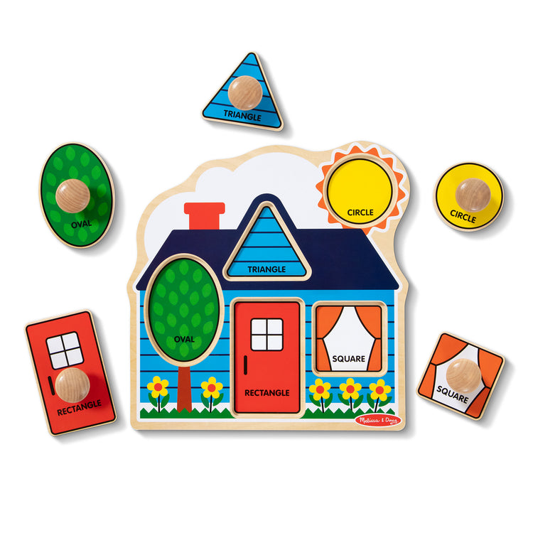 The loose pieces of The Melissa & Doug First Shapes Jumbo Knob Wooden Puzzle