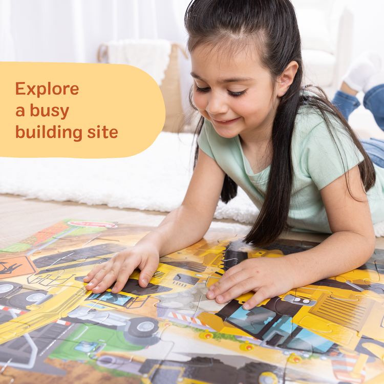 A playroom scene with The Melissa & Doug Building Site, Construction Themed Jumbo Floor Puzzle, 48‑Piece Construction Vehicle Jigsaw Puzzle, 3 x 2 Foot Toddler Puzzles for Kids Ages 3+
