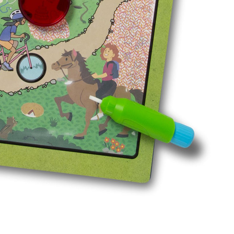 The loose pieces of The Melissa & Doug Let’s Explore Water Wow! Outdoor Adventure Deluxe Water-Reveal Pad – Reusable On The Go Travel Activity