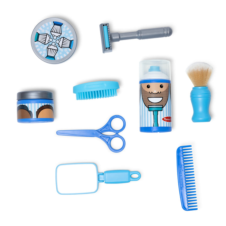 The loose pieces of The Melissa & Doug Barber Shop Pretend Play Set Shaving Toy for Boys and Girls Ages 3+