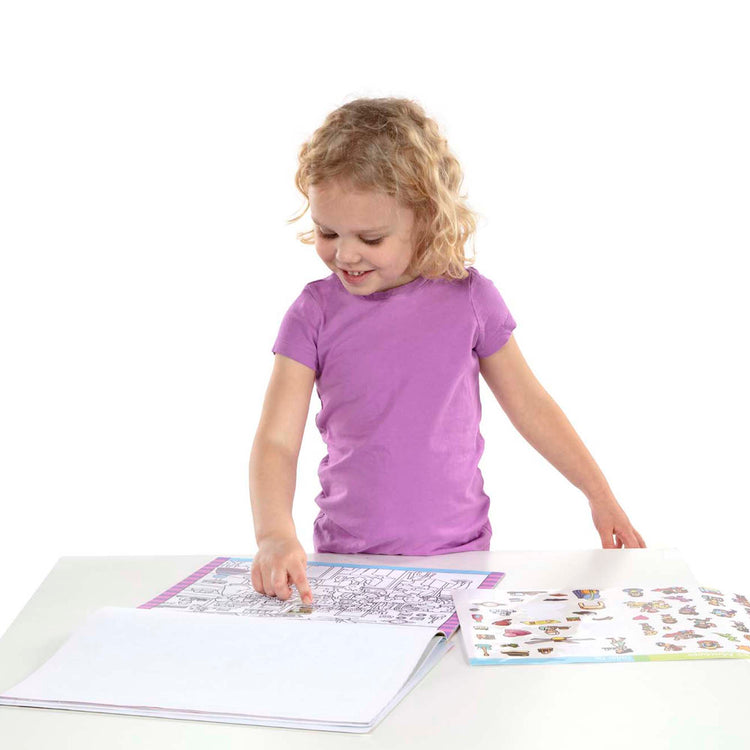 A child on white background with The Melissa & Doug Seek and Find Sticker Pad – Around Town (400+ Stickers, 14 Scenes to Color)