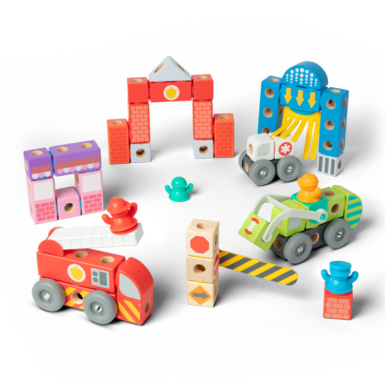 The loose pieces of The Melissa & Doug Blockables™ Deluxe City Snap And Play Amazon Exclusive, Mix and Match Connectable Wooden Building Blocks Play Set With Storage Bin and Play Lid (122 Pcs)