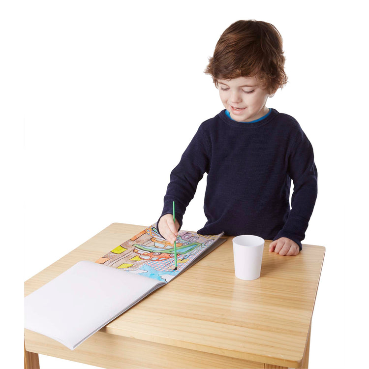 A child on white background with The Melissa & Doug My First Paint With Water Coloring Book - Vehicles (24 Painting Pages)