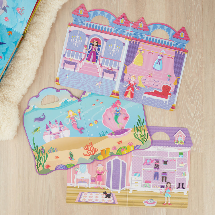 A playroom scene with The Melissa & Doug Puffy Sticker Activity Books Set: Dress-Up, Princess, Mermaid - 208 Reusable Stickers