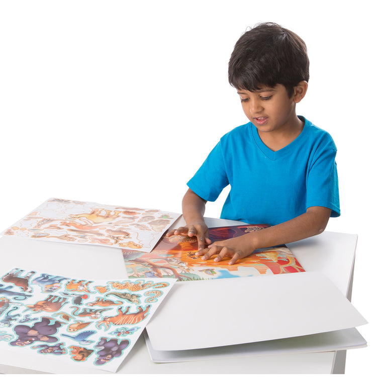 A child on white background with The Melissa & Doug Reusable Sticker Pad: Jungle and Savanna - 175+ Stickers, 5 Scenes