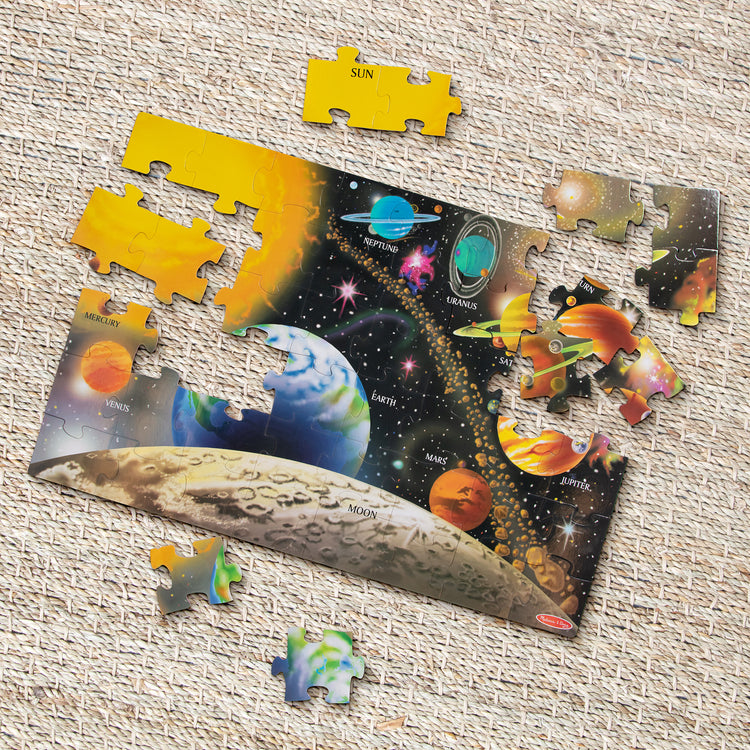 A playroom scene with The Melissa & Doug Solar System Floor Puzzle (48 pcs, 2 x 3 Feet)