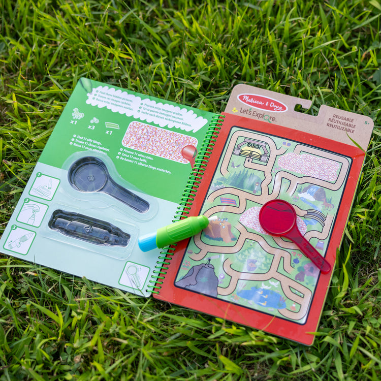 A playroom scene with The Melissa & Doug Let’s Explore Water Wow! Outdoor Adventure Deluxe Water-Reveal Pad – Reusable On The Go Travel Activity