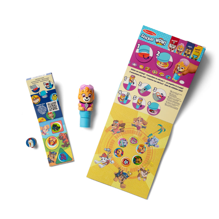 The front of the box for The Melissa & Doug Sticker WOW!™ PAW Patrol Skye Bundle: 24-Page Activity Pad, Sticker Stamper, 500 Stickers, Mini Pad, Arts and Crafts Fidget Toy Collectible Character