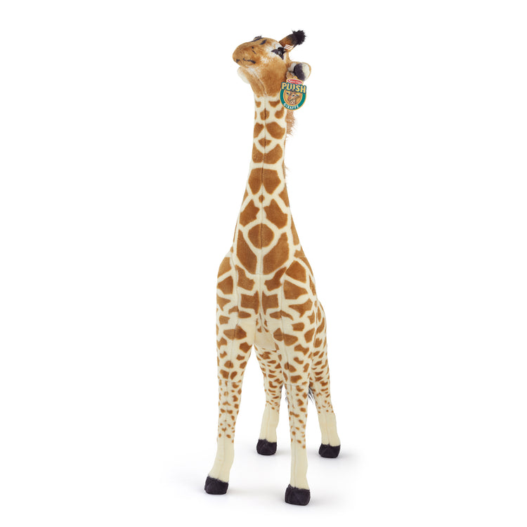 The front of the box for The Melissa & Doug Giant Giraffe - Lifelike Plush Stuffed Animal (over 4 feet tall)