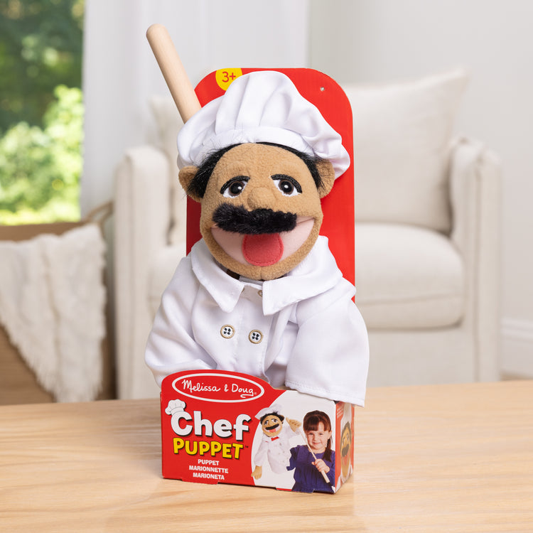 A playroom scene with The Melissa & Doug Chef Puppet (Al Dente) with Detachable Wooden Rod