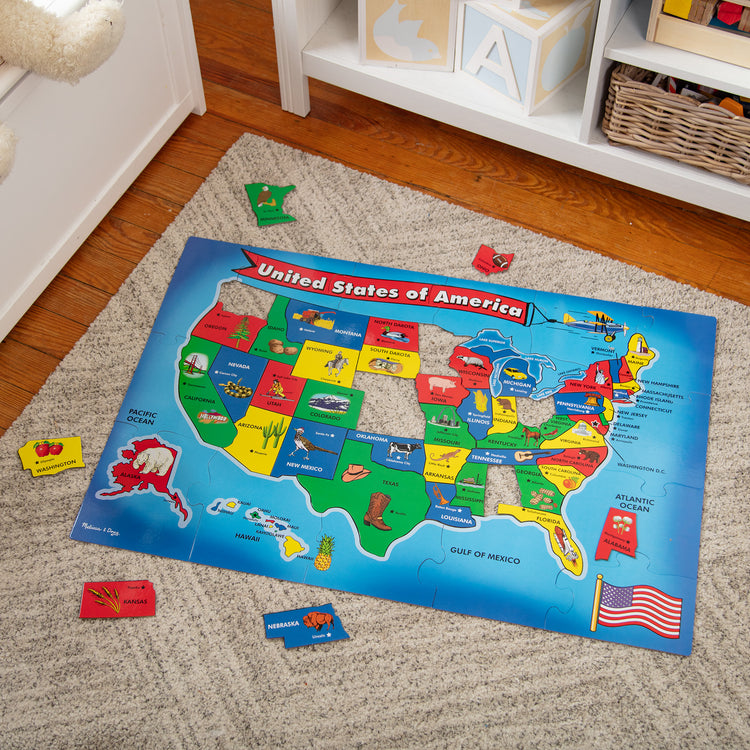 A playroom scene with The Melissa & Doug USA Map Floor Puzzle - 51 Pieces (2 x 3 feet)