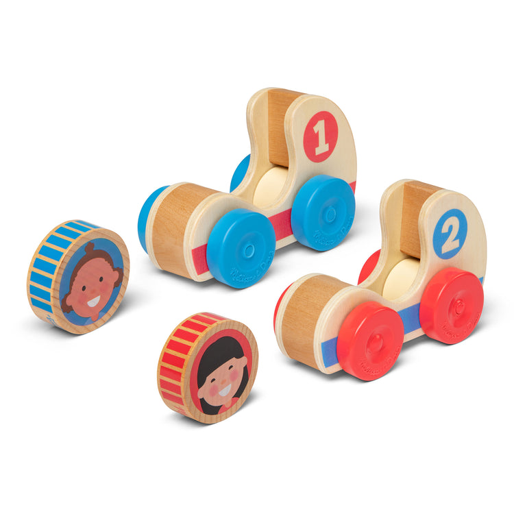The loose pieces of The Melissa & Doug GO Tots Wooden Race Cars (2 Cars, 2 Disks)
