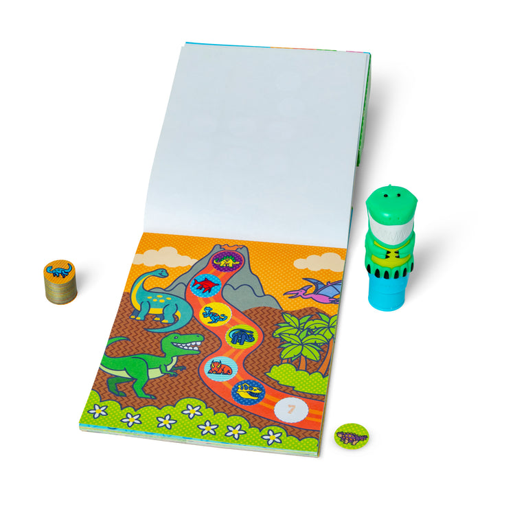 The loose pieces of The Melissa & Doug Sticker WOW!™ Dinosaur Bundle: Sticker Stamper, 24-Page Activity Pad, 600 Total Stickers, Arts and Crafts Fidget Toy Collectible Character