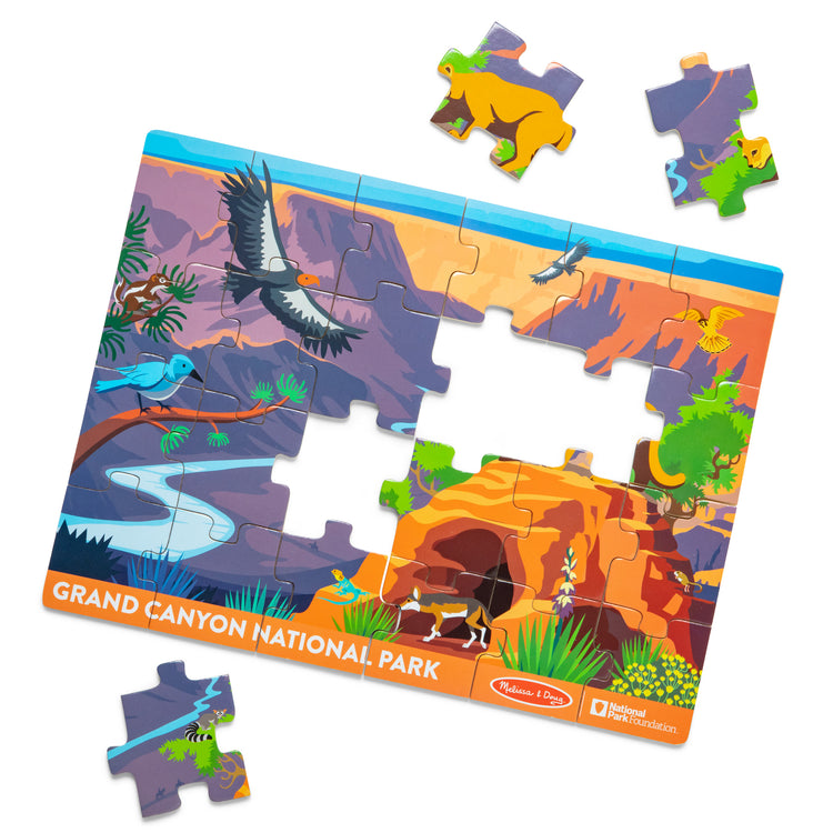 The loose pieces of The Melissa & Doug Grand Canyon National Park Wooden Jigsaw Puzzle – 24 Pieces, Animal and Plant ID Guide