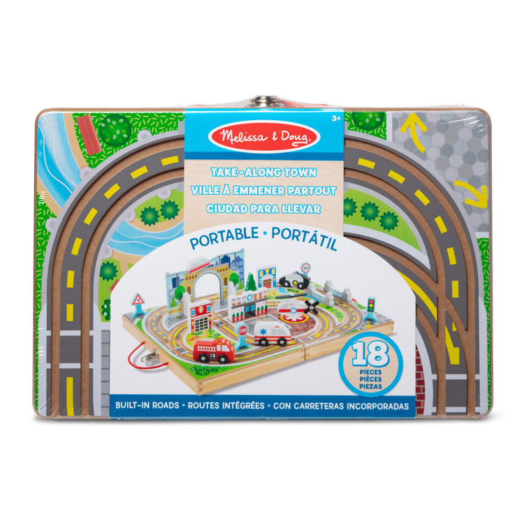 The front of the box for The Melissa & Doug 18-Piece Wooden Take-Along Tabletop Town, 4 Rescue Vehicles, Play Pieces, Bridge