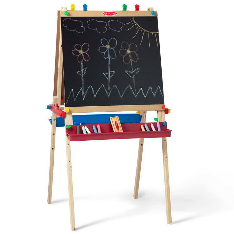 An assembled or decorated The Melissa & Doug Deluxe Standing Art Easel - Dry-Erase Board, Chalkboard, Paper Roller
