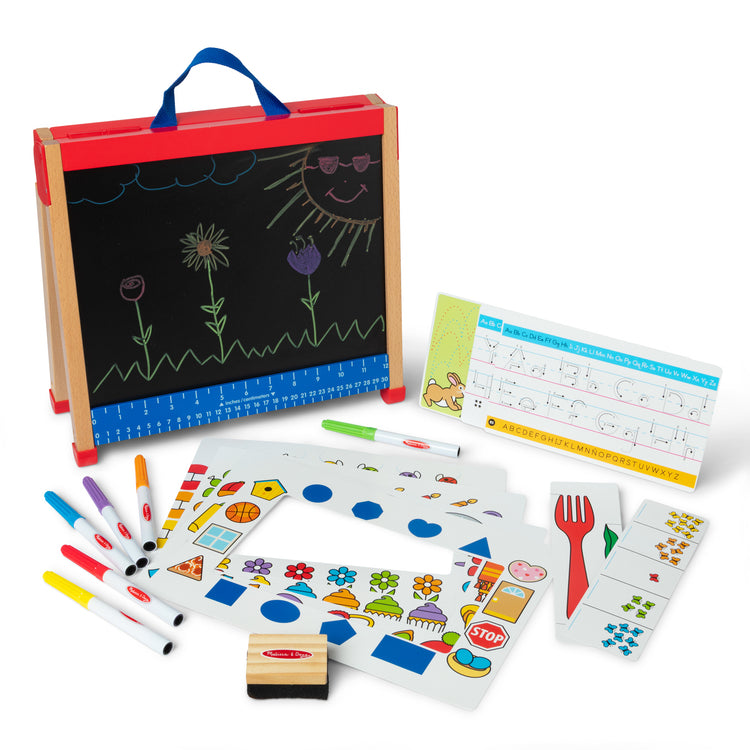 The loose pieces of The Melissa & Doug Take-Along Double-Sided Wooden Tabletop Activity Art Easel; Portable Travel Toy with Whiteboard, Chalkboard, Arts and Crafts Accessories