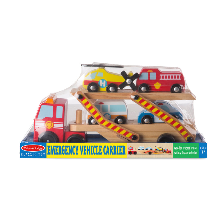 The front of the box for The Melissa & Doug Wooden Emergency Vehicle Carrier Truck With 1 Truck and 4 Rescue Vehicles