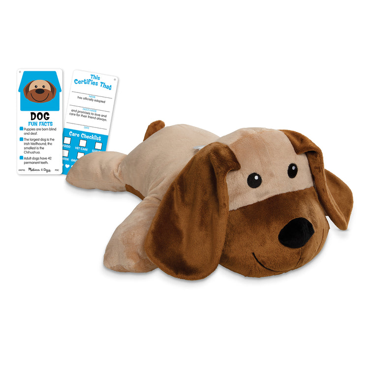 The loose pieces of The Melissa & Doug Cuddle Dog Jumbo Plush Stuffed Animal with Activity Card